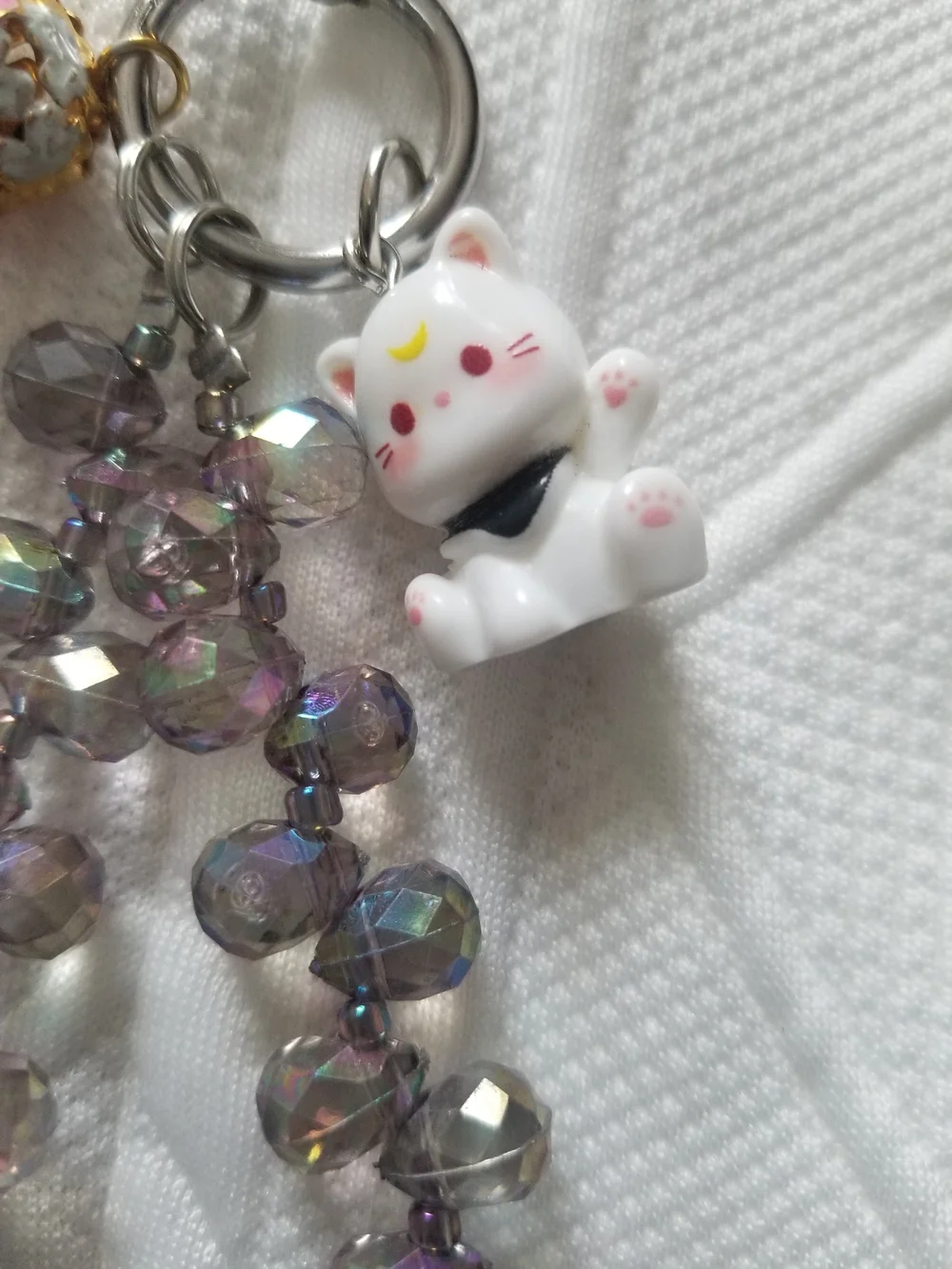 Iridescent Faceted Bead Phone Chain with Lucky Cat Charm and Bell